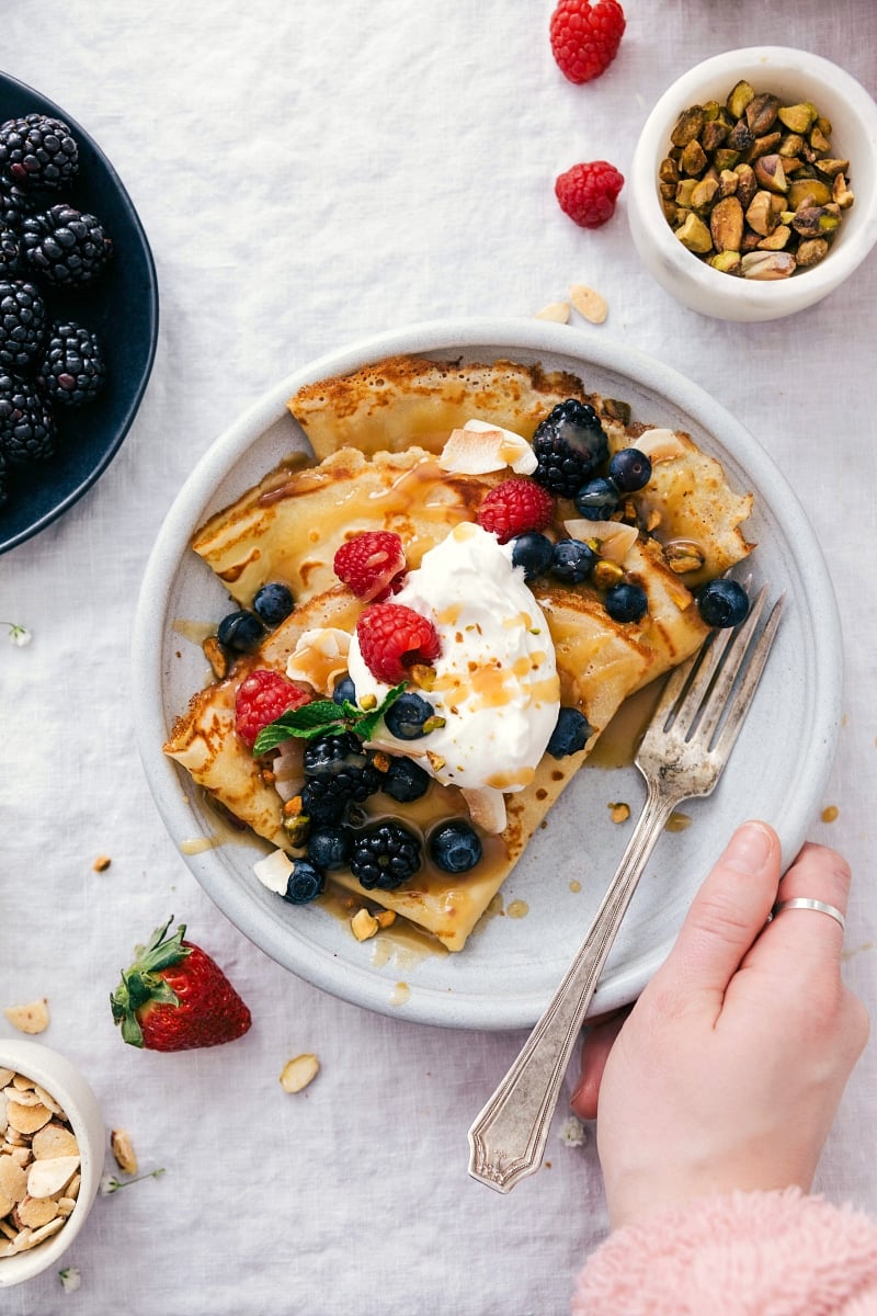 Overhead image of the completed crepes with toppings.