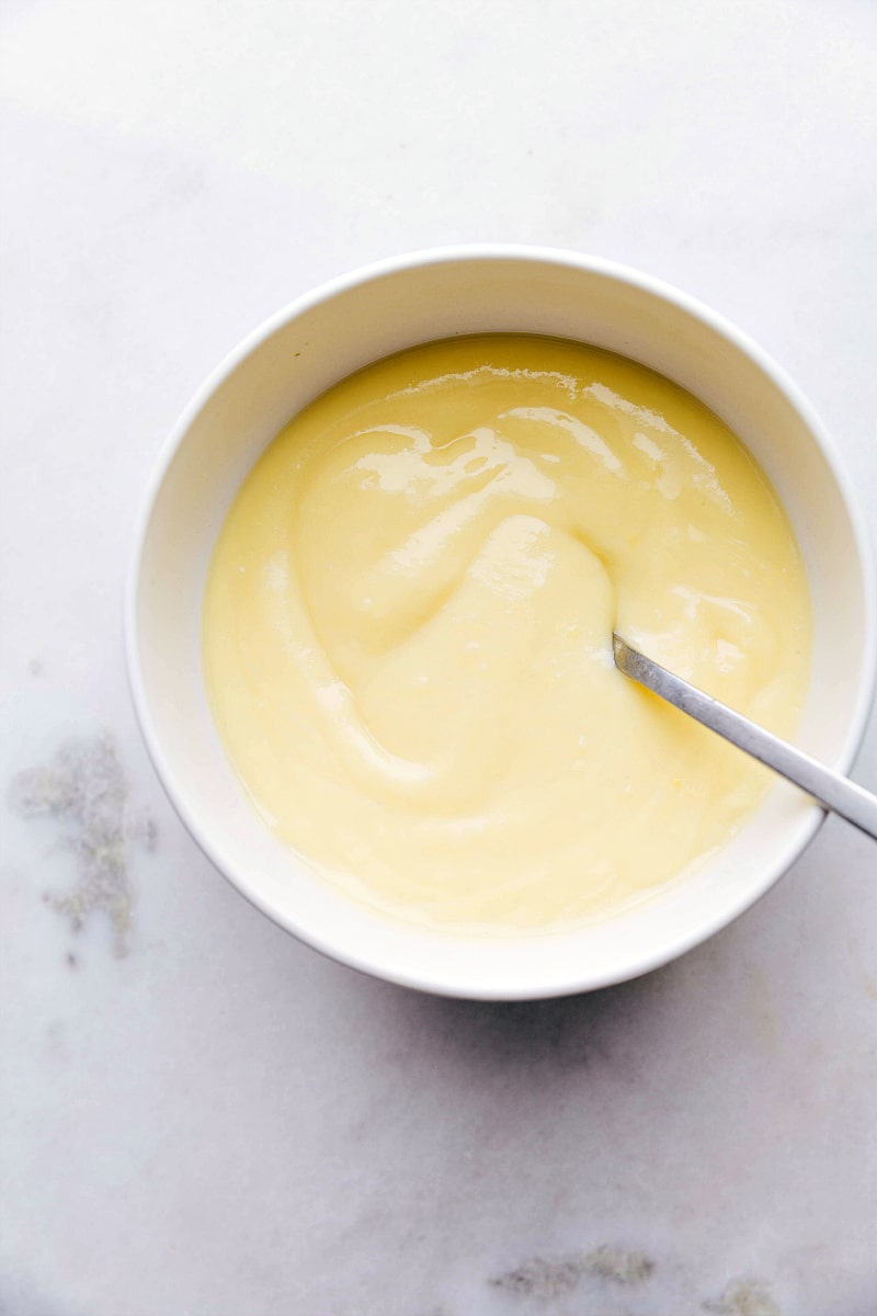 Custard filling for banana crepes in a bowl.
