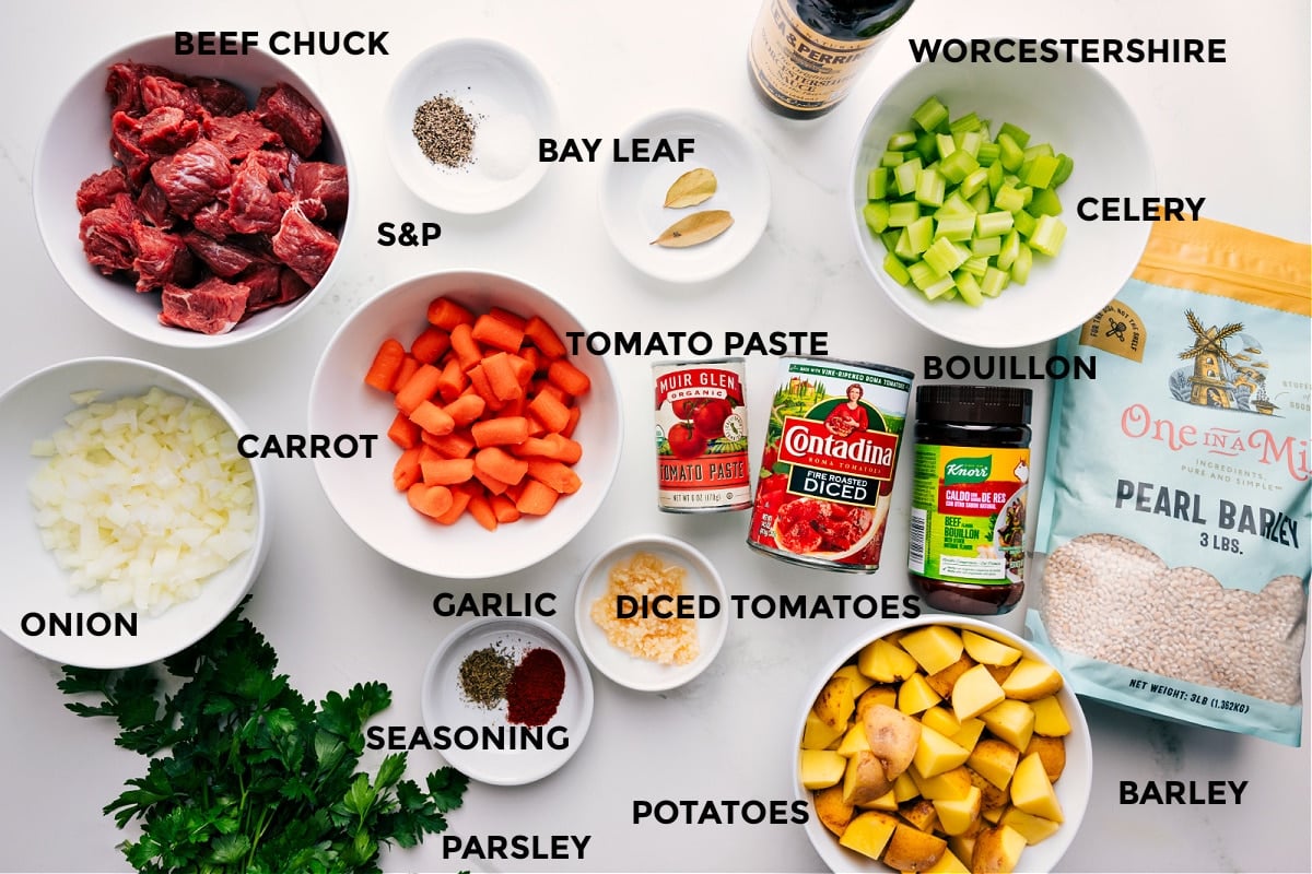 Ingredients In Slow Cooker Beef And Barley Soup All the ingredients in this recipe prepped out for easy assembly including onion, carrot, beef, seasonings, tomato paste, potatoes, barley, celery, and Worcestershire.