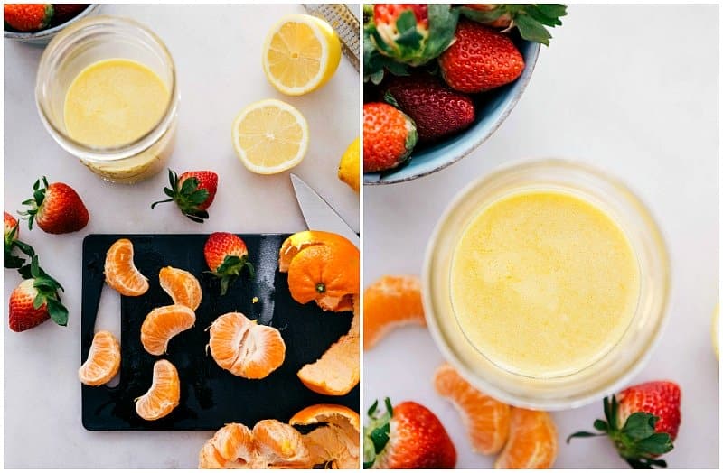 Overhead image of the citrus dressing and the oranges and strawberries going into the salad