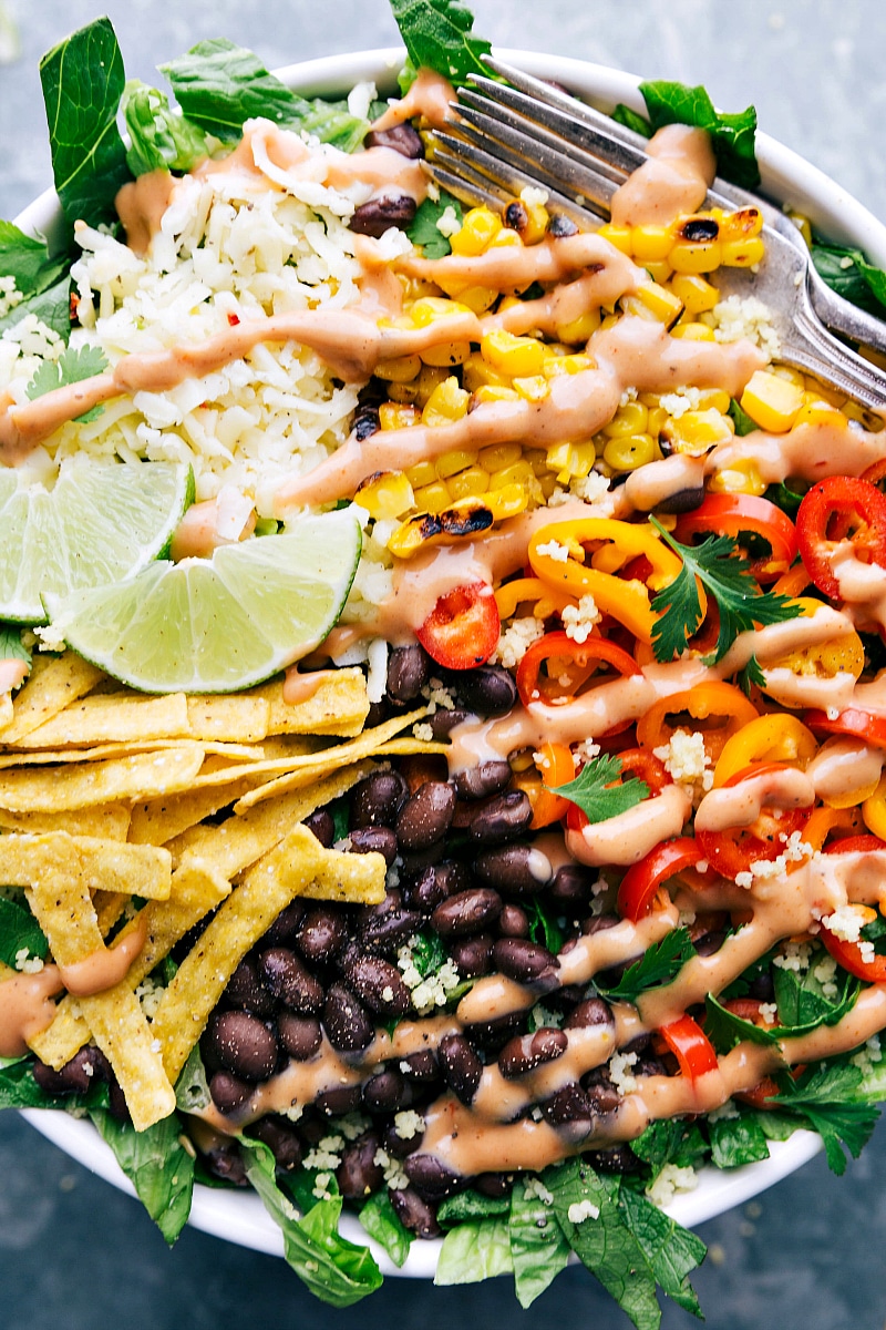 Overhead image of the ready-to-eat Black Bean Corn Salad with the dressing on it.