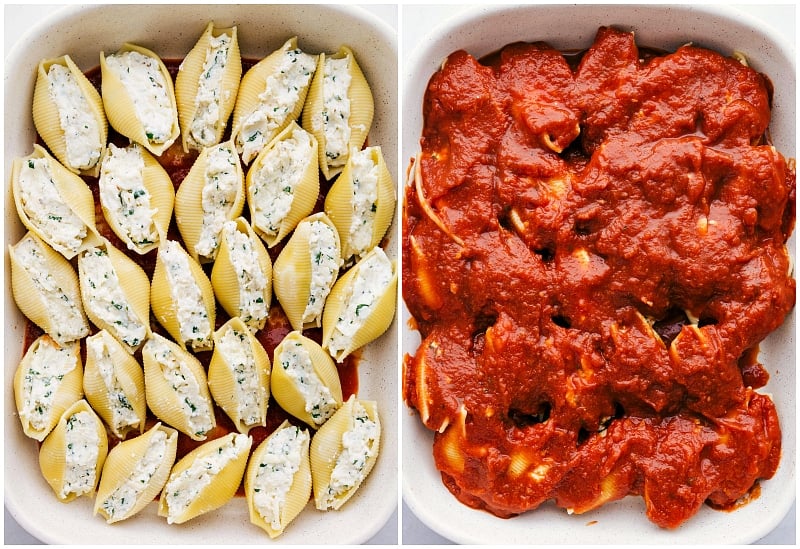 Shells placed in the pan with marinara sauce covering the shells.