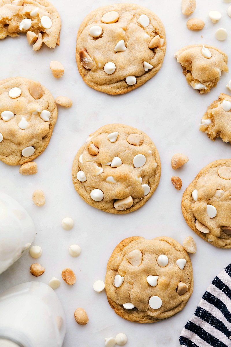 Baked White Chocolate Macadamia Nut Cookies on a board.