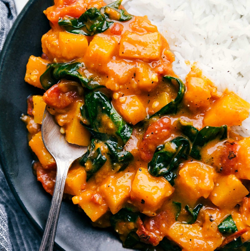 Up close image of the ready to eat butternut squash curry with rice on the side