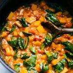 Butternut Squash Curry in the pot with the spinach added.