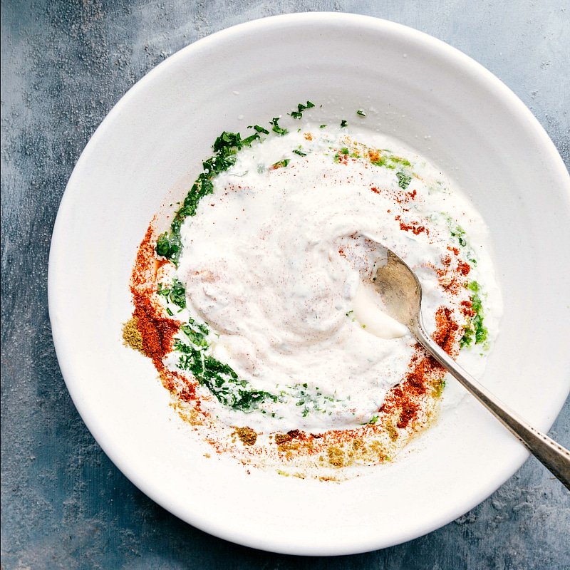 Image of the elote cream sauce being all mixed with the spices.