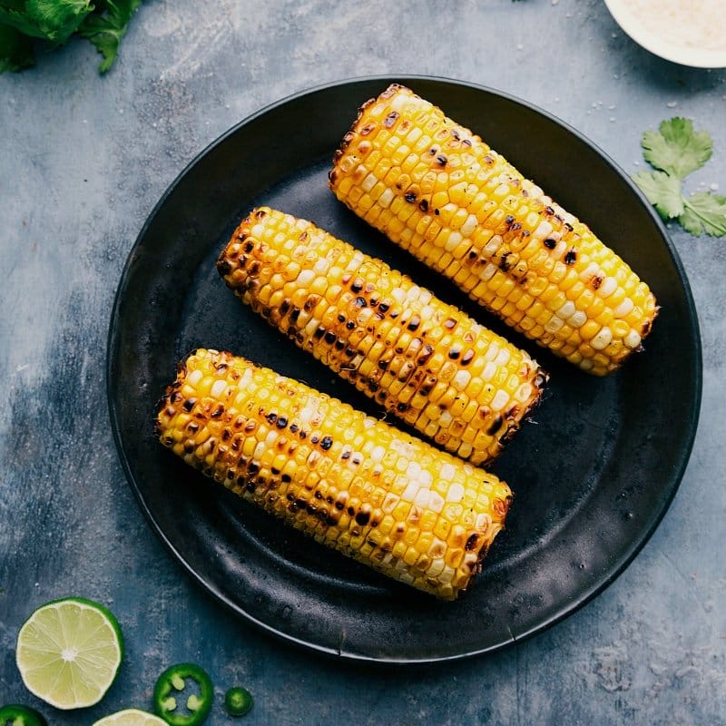 Image of the roasted corn on the cob ready to be made into elote.