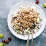 Ready-to-eat Grape Salad with brown sugar and pecans on the top.
