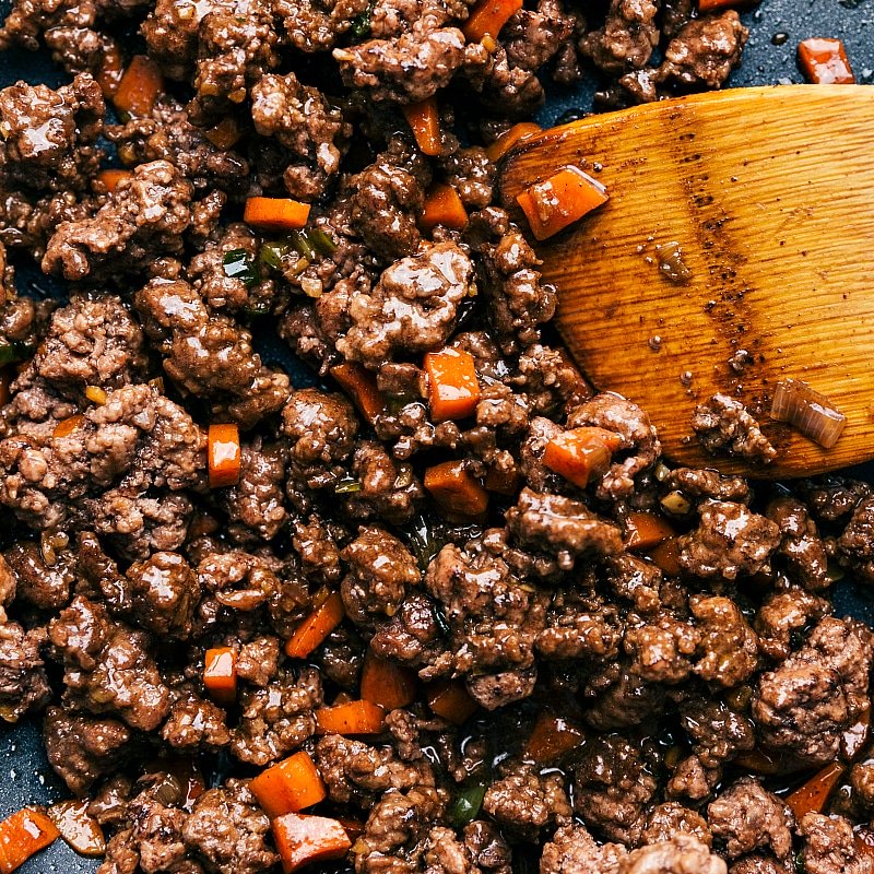 Cooked ground beef with carrots used in Asian-style Beef Lettuce Wraps.