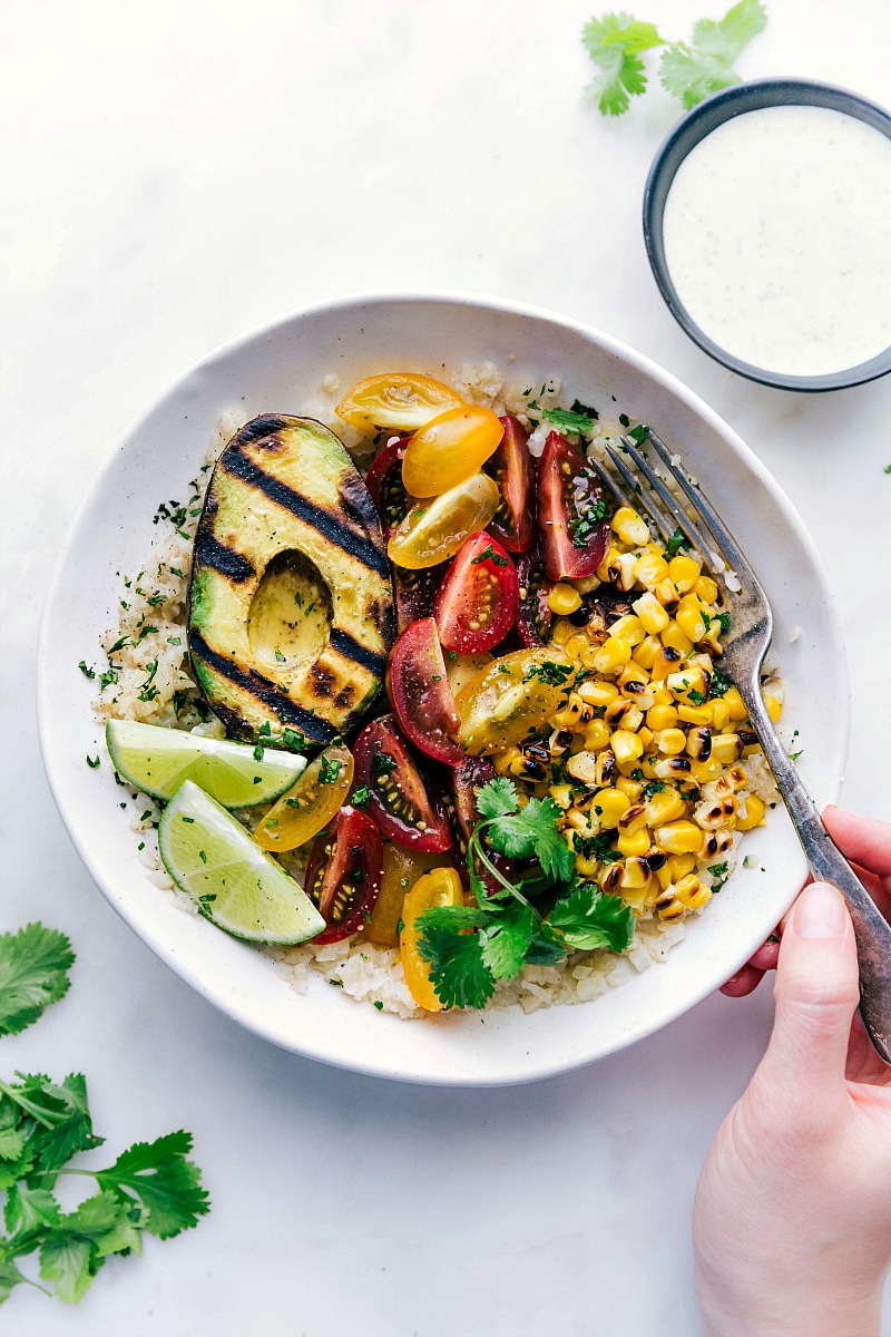 Up-close photo of the finished Grilled Avocado Bowls.