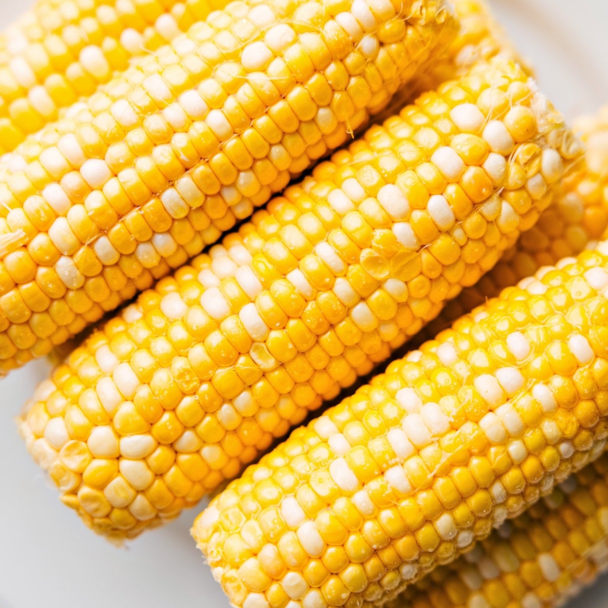 Prepping The Fresh Corn For This Elote Recipe Fresh corn for this elote recipe, shucked and ready to cook.