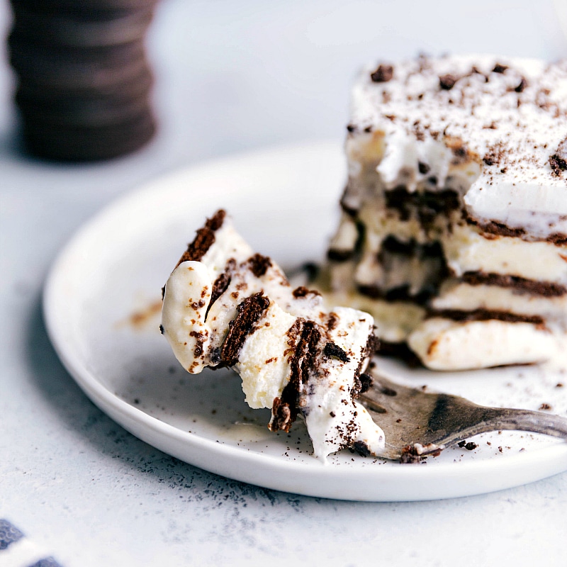 Dessert with a bite out of it and a fork holding the bite.