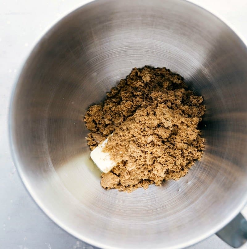 Process shot-- Image of the brown sugar and butter in a bowl getting ready to be mixed.