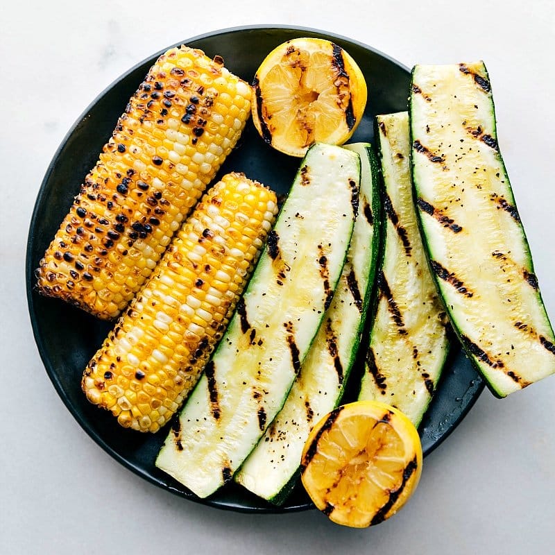 Image of the grilled corn, zucchini, and lemon that go on the side salad with the Flat Iron Steak.