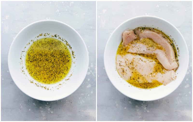 Chicken being added to a bowl filled with a flavorful greek chicken marinade, showcasing the marinating process that enhances the taste of this recipe.