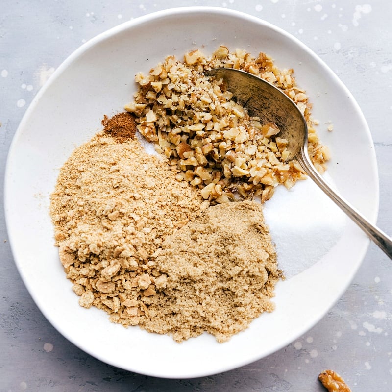 Preparing the brown sugar and walnut topping, a mouthwatering addition to the dessert, adding a sweet and crunchy finish.