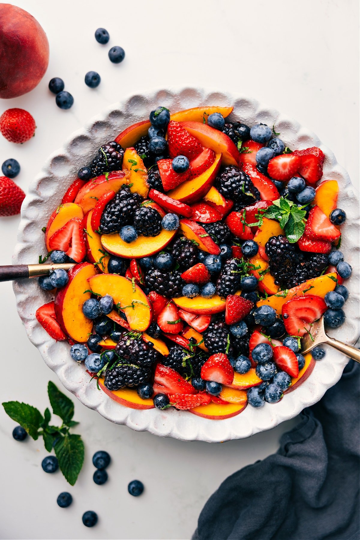 Fresh And Flavorful Peach Fruit Salad Peach Fruit Salad tossed together with the best dressing.