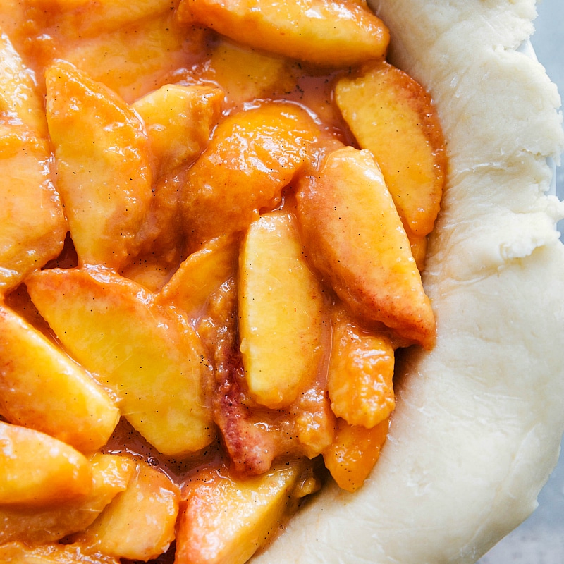 Delicious filling being poured into the prepared crust, ready for baking.