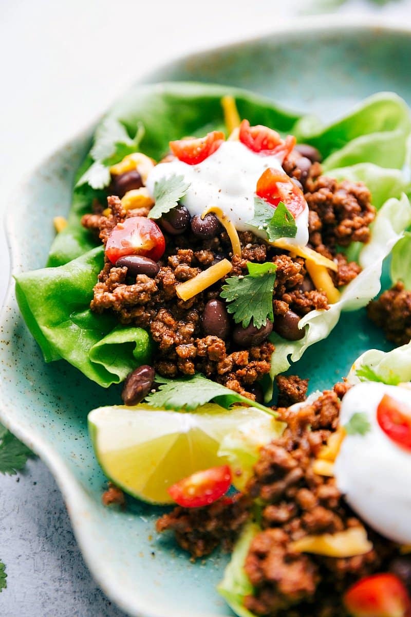 Ready-to-eat taco lettuce wraps on a plate, offering a healthy twist on a classic favorite meal.