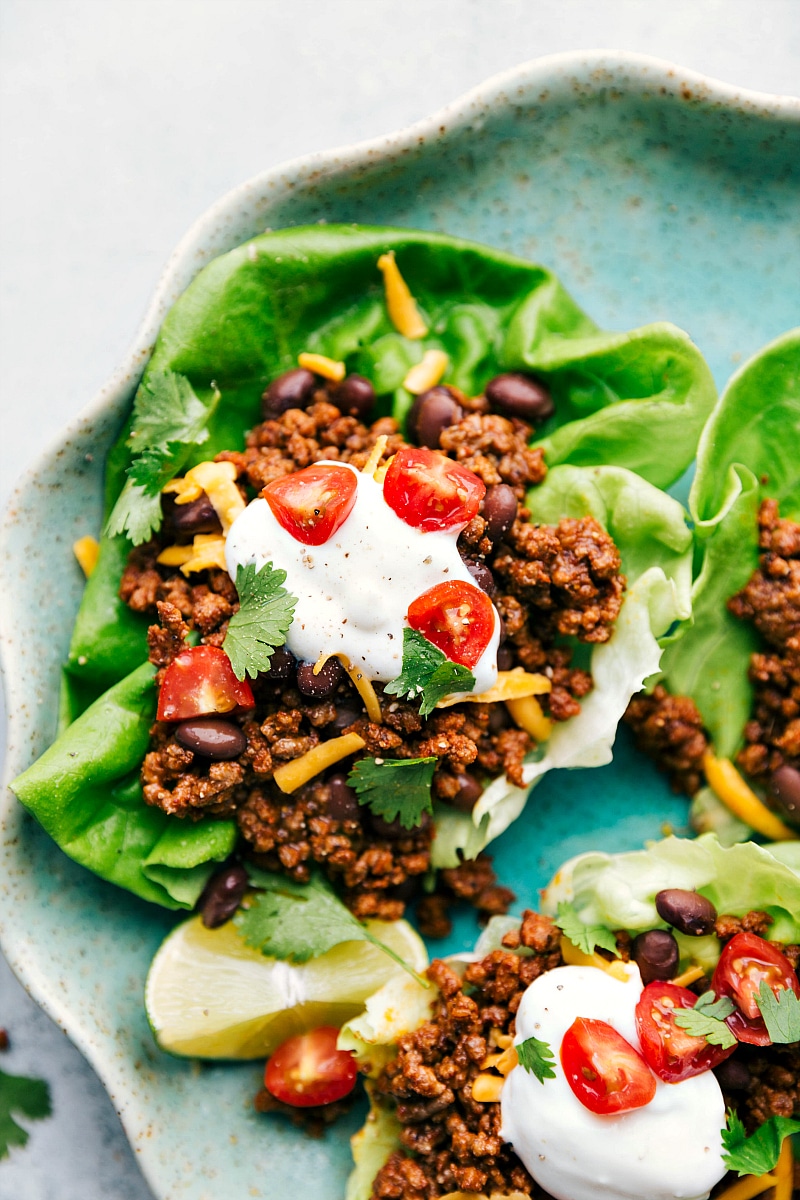 Up-close image of the Taco Lettuce Wraps with sour cream and other toppings.