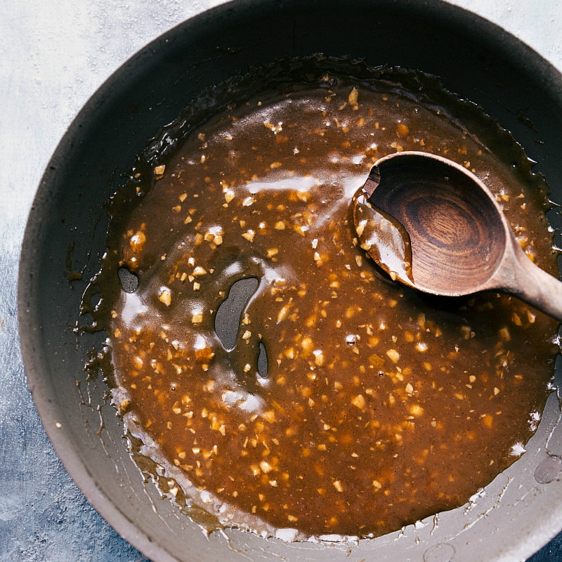 Preparing the apricot glaze sauce in a pan, a sweet and fruity sauce.