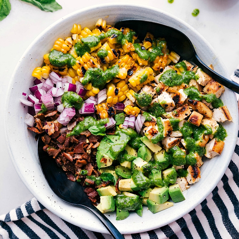 The dressed chicken avocado salad, a delicious meal beautifully presented and ready to be savored.