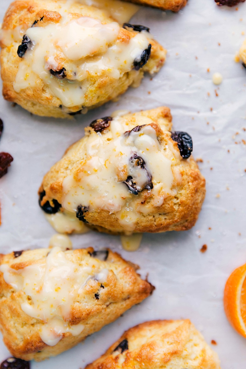 Overhead image of Tart Cherry Scones with the glaze on top, ready to be eaten.