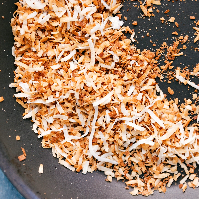 Process shot-- image of the coconut being toasted for this amazing Coconut Cream Pie.