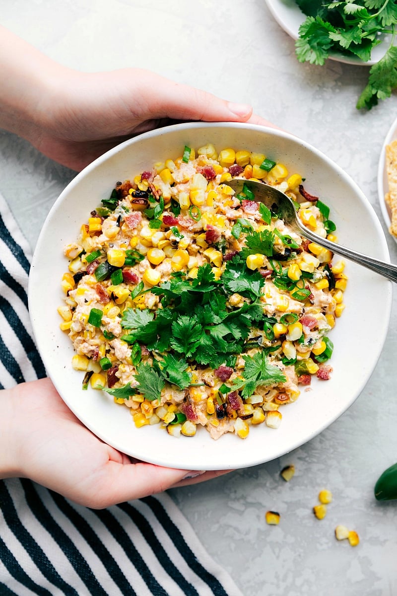 Creamy corn salad, rich and packed full of flavor, ready to be enjoyed as a delightful side dish.