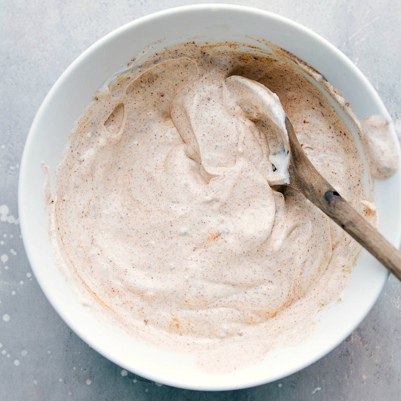 The finished sauce in a bowl, full of rich flavors, ready to enhance the dish.