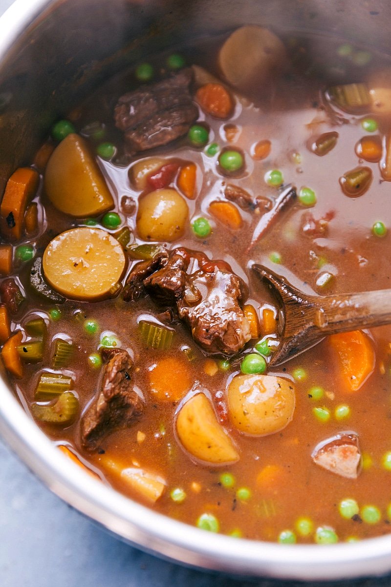 Delicious and hearty beef stew instant pot recipe being stirred before serving.