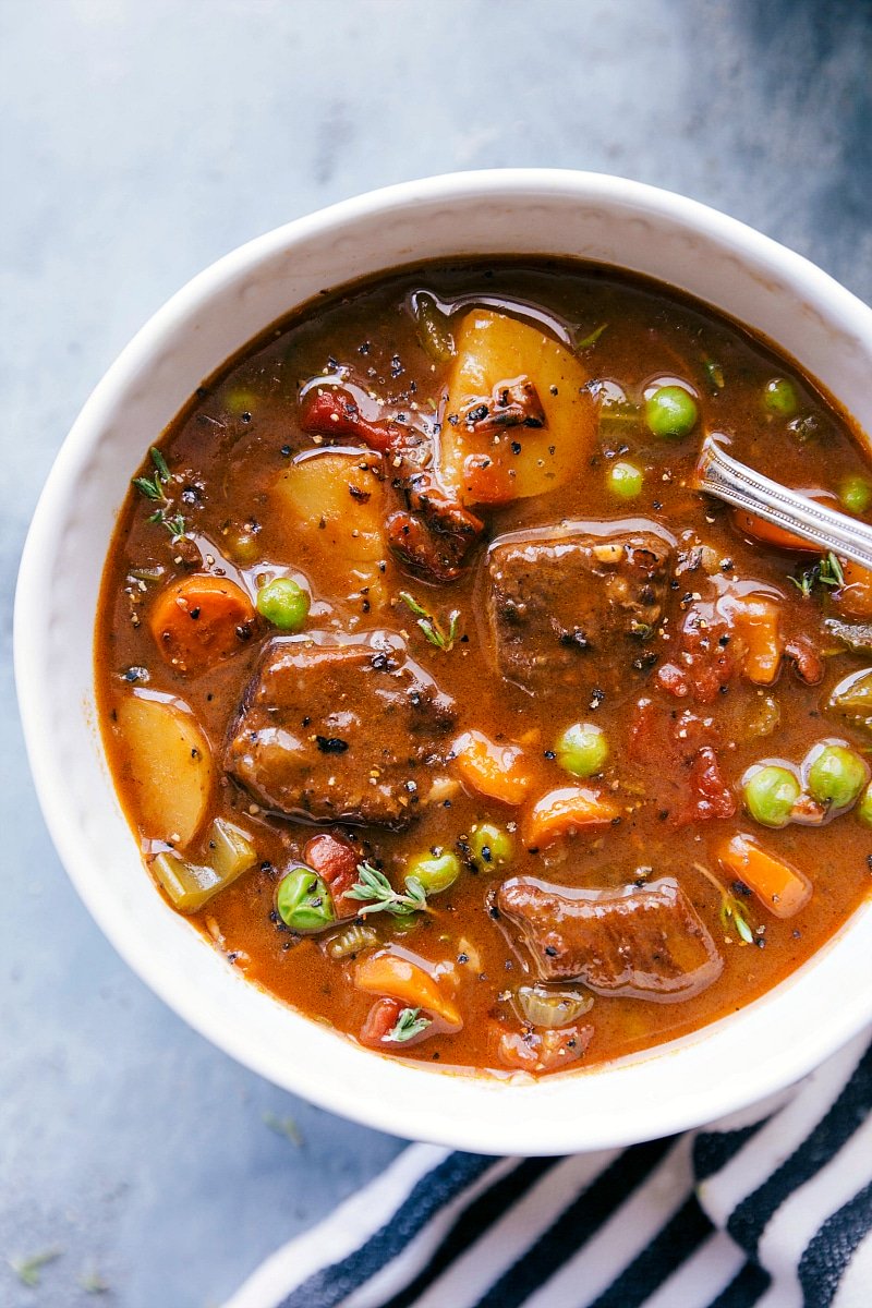 Instant pot beef stew in a bowl, warm and hearty, ready to be eaten.