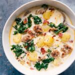 A bowl of the hearty and warm zuppa toscana soup ready to be enjoyed.