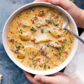 Sausage potato soup in a bowl, hearty, savory, and delicious ready to eat.