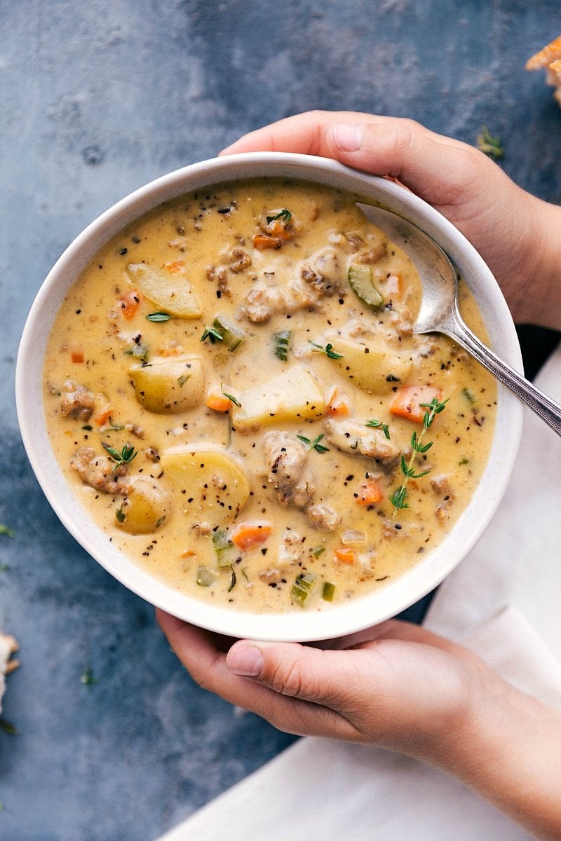 Sausage potato soup in a bowl, hearty, savory, and delicious ready to eat.