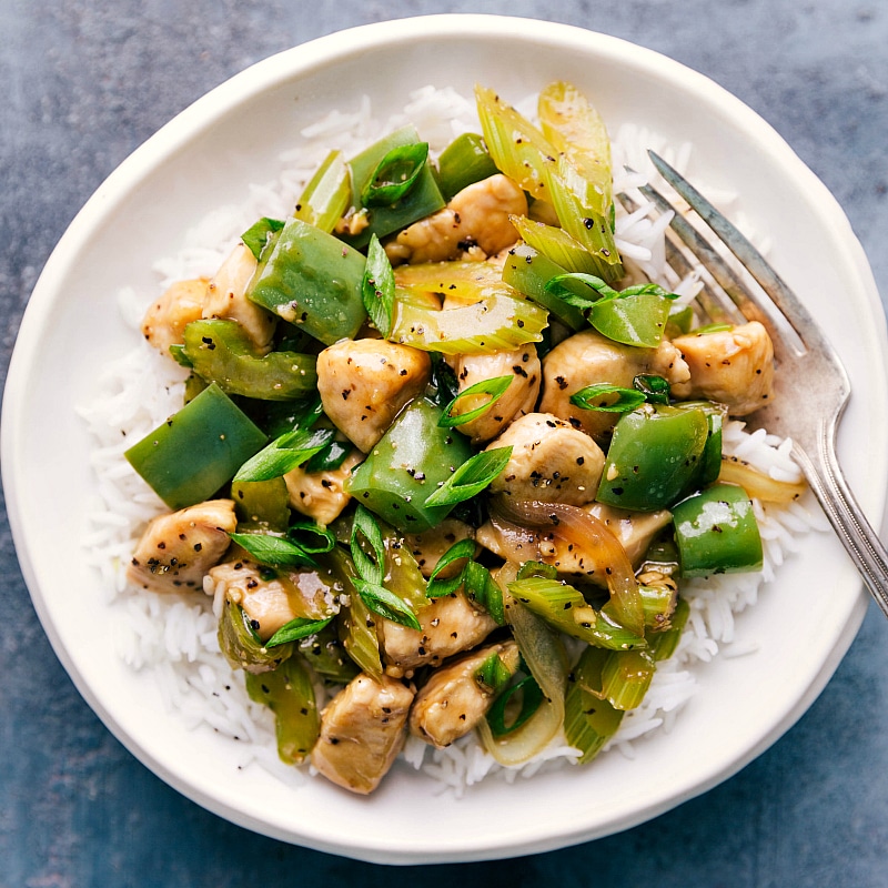 Overhead image of Black Pepper Chicken over a bed of rice.