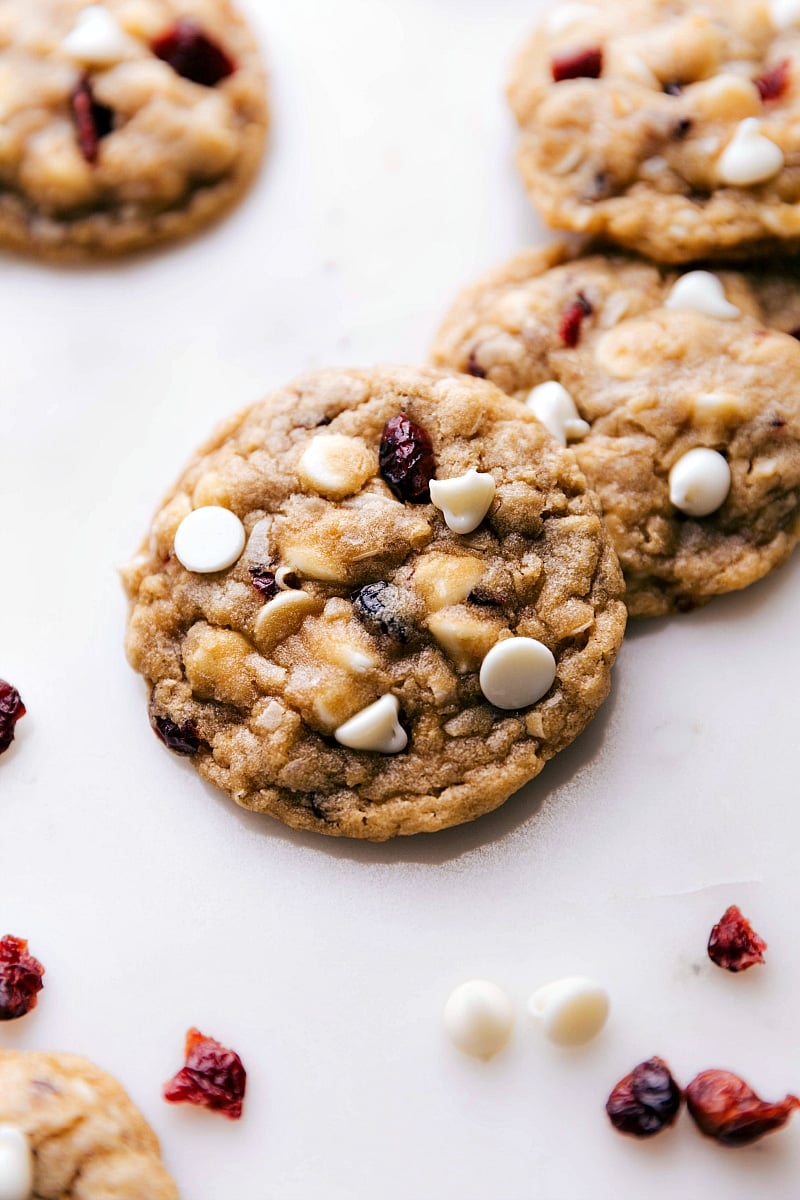 Freshly baked oatmeal cranberry cookies with white chocolate chips and dried cranberries, straight from the oven and ready to delight.