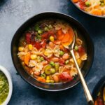The best vegetable soup in a bowl, warm with noodles and a variety of vegetables, ready for a comforting meal.