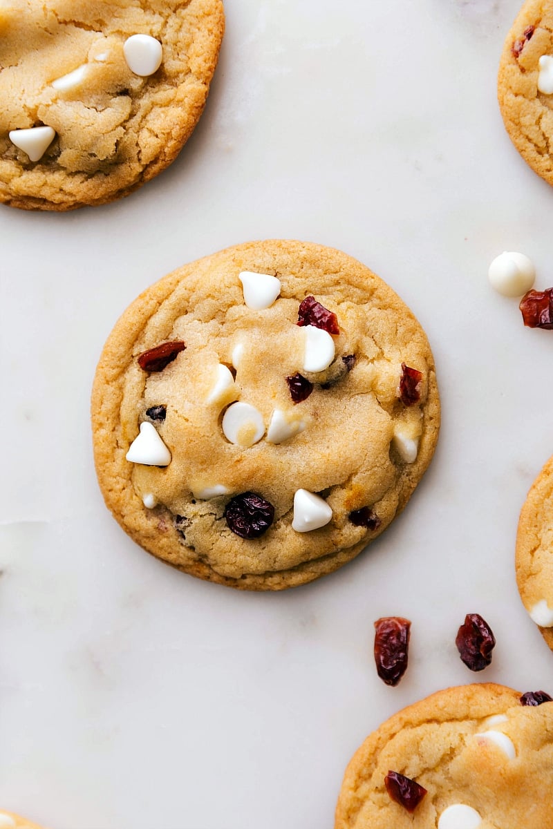 Warm, freshly baked cranberry white chocolate cookies, ready for indulgence.