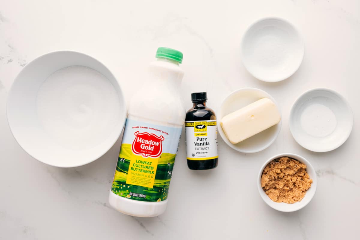Combining and Heating Ingredients in Pan for Recipe Preparation All the ingredients in this recipe prepped out for easy assembly including the sugar, buttermilk, vanilla, brown sugar, butter, salt, and baking soda.