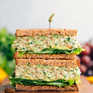 Curry Chicken Salad in whole grain bread stacked on top of each other.