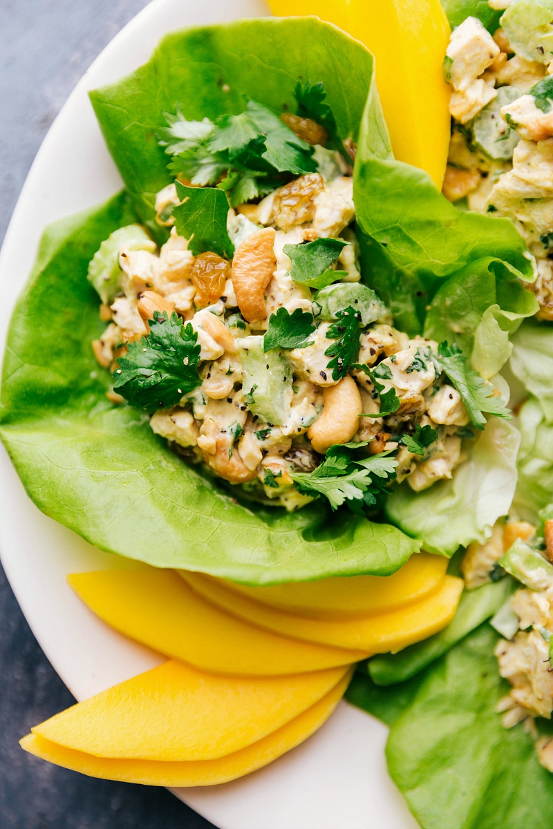 Healthy curry chicken salad in a crisp lettuce wrap, perfect for a nutritious and satisfying meal.