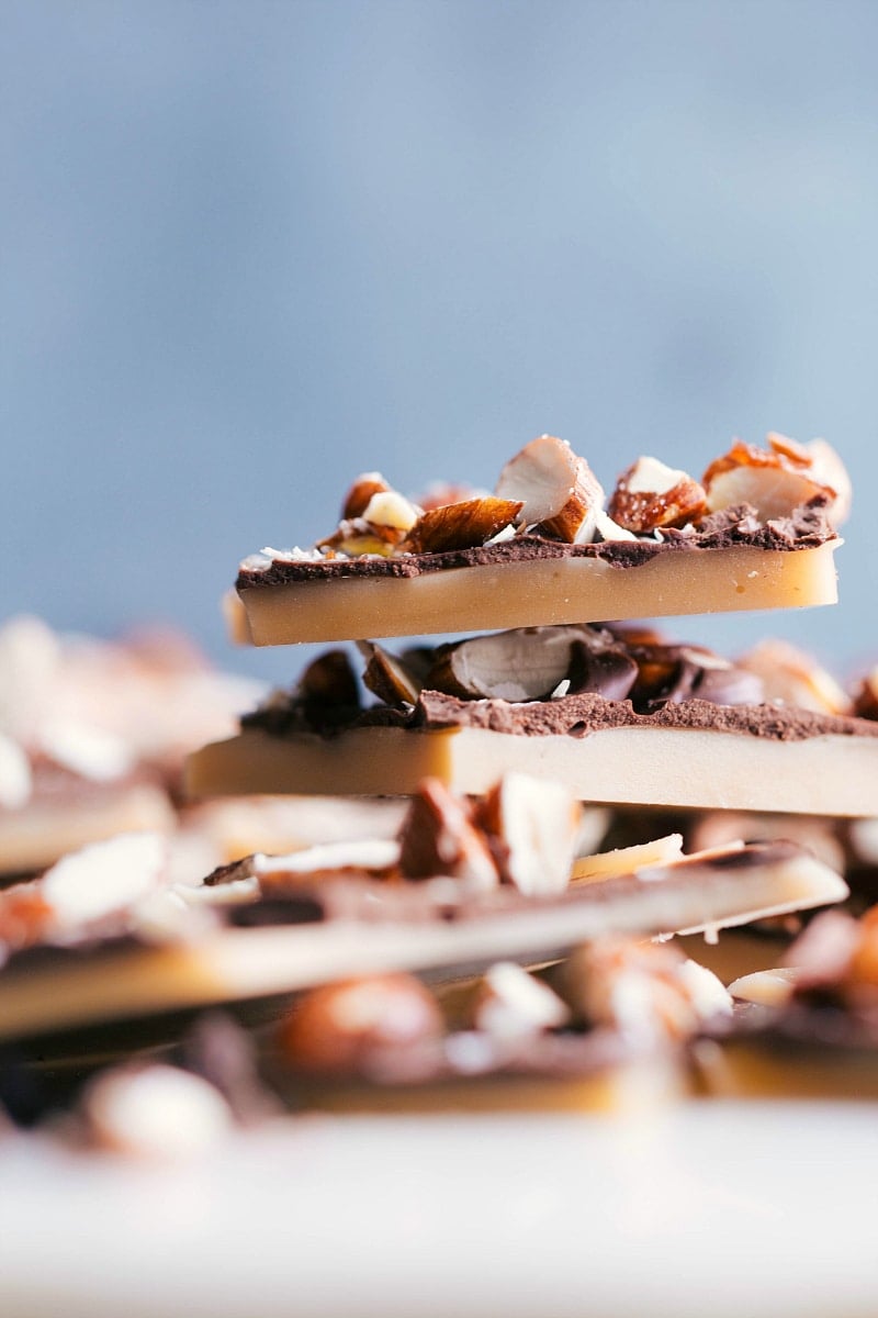 Layered toffee pieces stacked, showcasing their rich and crunchy texture.