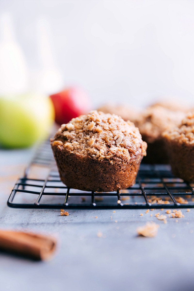 Image of Apple Muffins fresh out of the oven, sitting on a cooling rack.