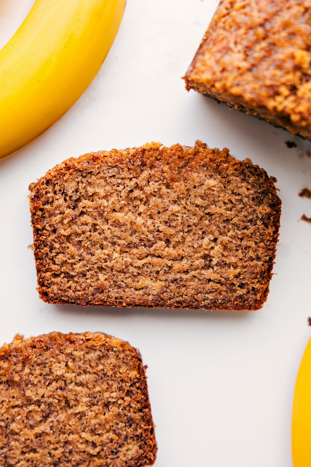 Sliced Healthy Banana Bread A slice of Greek yogurt banana bread, just waiting to be enjoyed.