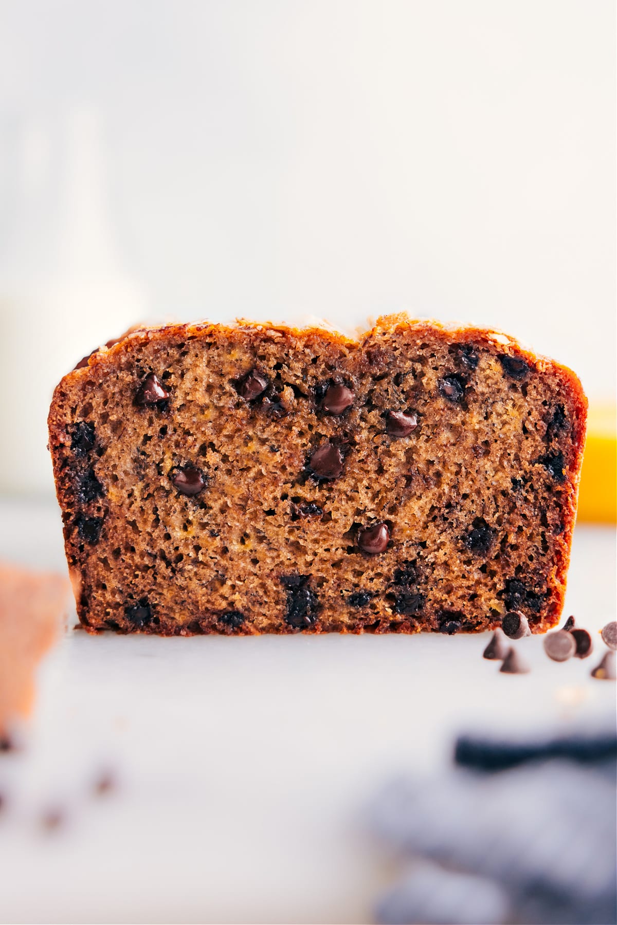 A perfectly baked loaf, cut open to reveal the fluffy and delicious interior with chocolate chips.