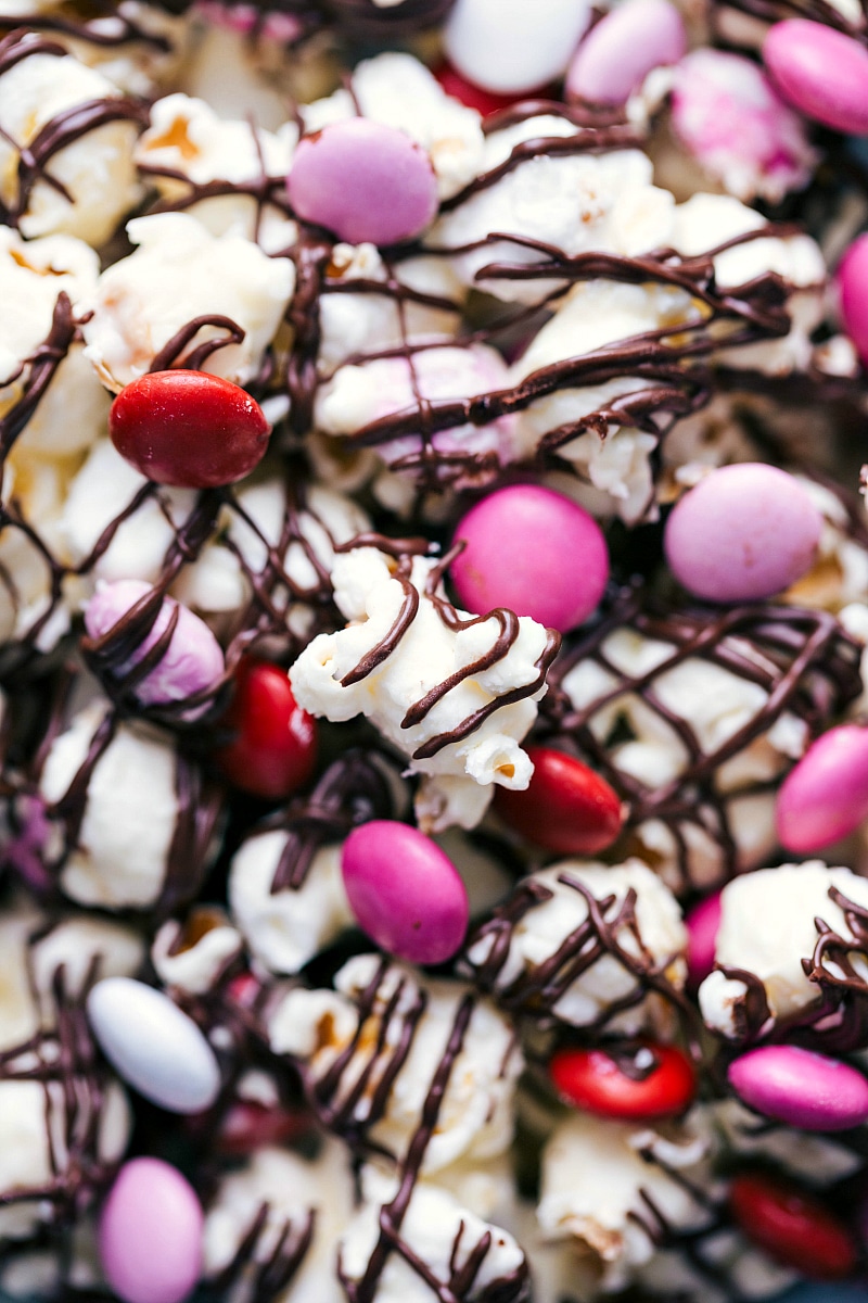 Delicious valentine popcorn, featuring chocolate and colorful valentine's M&M's.