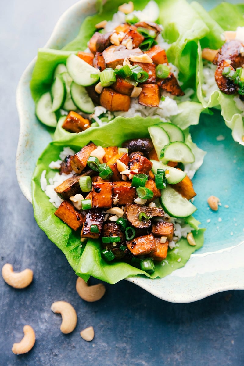 Image of the vegetarian lettuce wraps with everything in them ready to be eaten