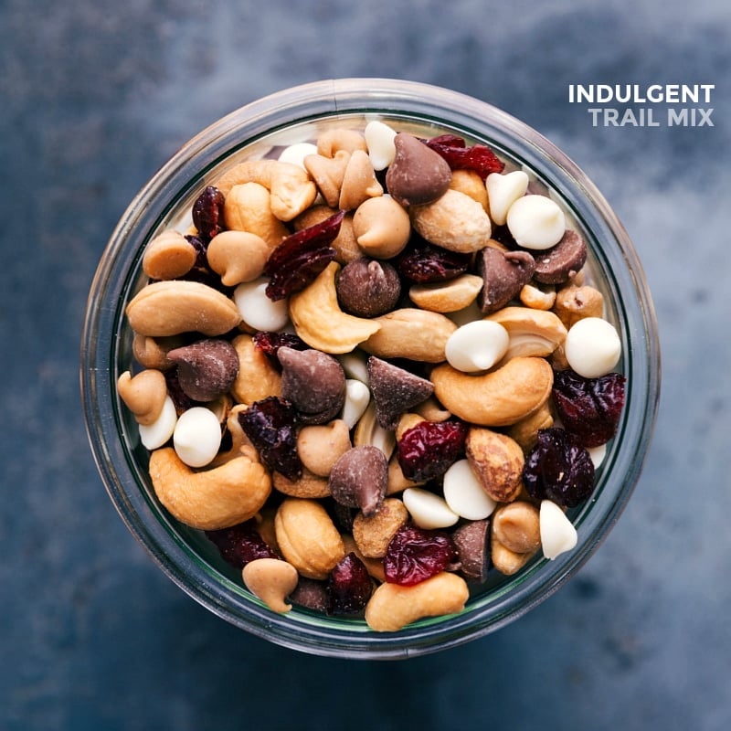 Jar filled with the finished, ready-to-eat snack, featuring a blend of nuts, dried fruits, and other tasty morsels.