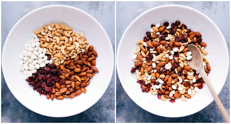 Ingredients for a healthy trail mix, such as walnuts, pecans, dried cherries, pistachios, pepitas, sunflower seeds, cocoa-roasted almonds, and coconut chips, being combined.